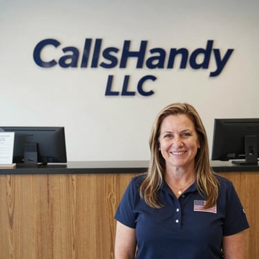 A friendly call center agent speaking on the phone with a headset in a bright, modern office.