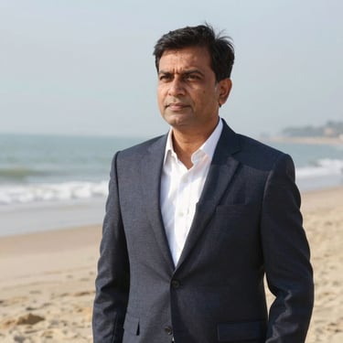Photo of a smiling man holding a fire extinguisher in a kitchen setting