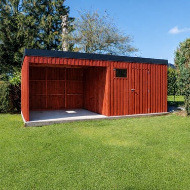 a garden shed with board and batten siding painted with a barn red breathable paint Dalsberg