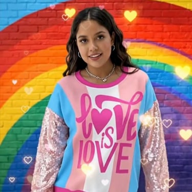 transgebder women in a love is love, trans pride flag top