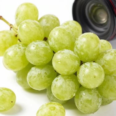 Macro shot of fresh green seedless grapes, crisp and uniform, on a clean white background, bright daylight, high-end commercial lens