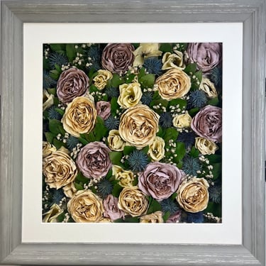 a stunning flower wall style preserved wedding bouquet in a frame