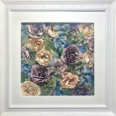 an ivory blue and purple flower wall style preserved wedding bouquet in a frame