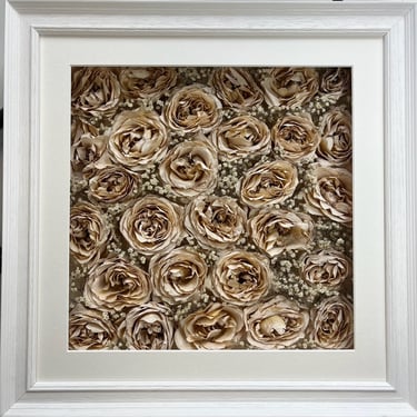 a photo of a flower wall style preserved wedding bouquet in a frame