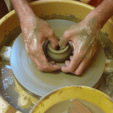 Taking a ceramic lesson in Crete, shaping traditional pottery