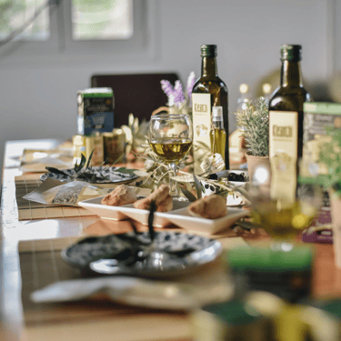 Tasting fresh olive oil at a table in Crete