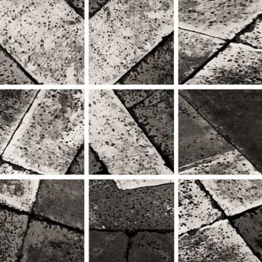 Abstract photographic collage in black and white with geometric stone patterns