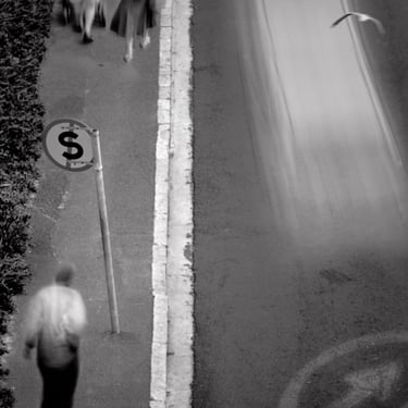 Black-and-white urban fine art photograph from Martin Osner’s “On the Move” collection featuring a no stopping sign