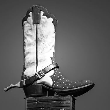 Big Boot - a big western cowboy boot. on top of a roadside business sign in Weir, TX circa 2013