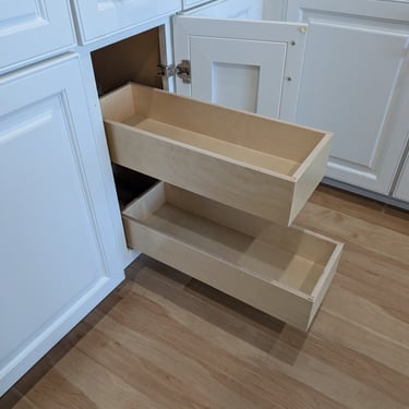 Full extension glide outs make a narrow cabinet much more useful.