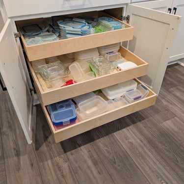 Three slide-out shelves to maximize the organization of food storage containers.
