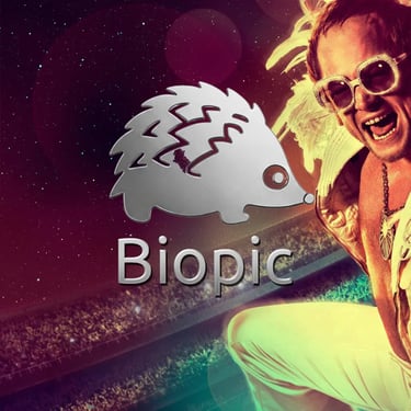 a man with a beard and sunglasses on a field