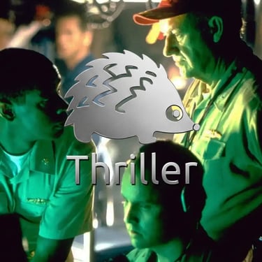 a man and a woman are looking at a computer screen