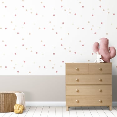 Children's bedroom interior with minimalist wallpaper with pink and red abstract balls