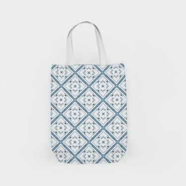 a baguet bag with a blue and white geometric  pattern
