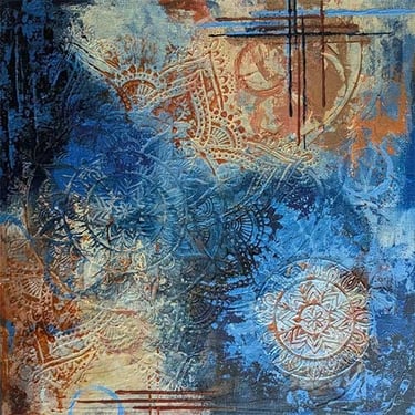 Abstract mandalas emerge in ochre and blues