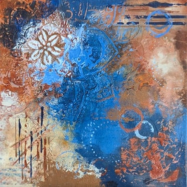 Indigo, clay, and copper tones in an abstract mandala painting