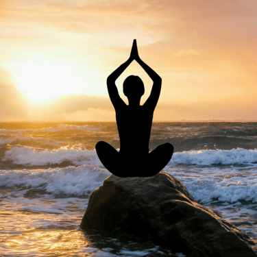 a lady is doing yoga pose near the sea