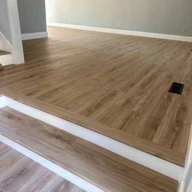 vinyl planks installed over plywood.