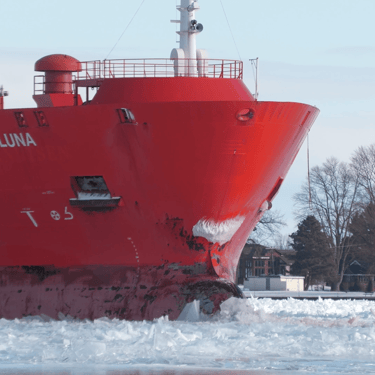 A close-up view of tanker ship Algoluna's bulbous bow breaking through ice on the St. Clair River.
