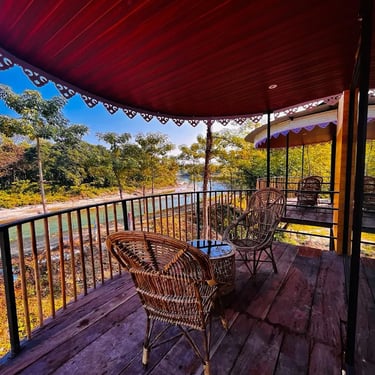 a bedroom with a bed and a ceiling fan