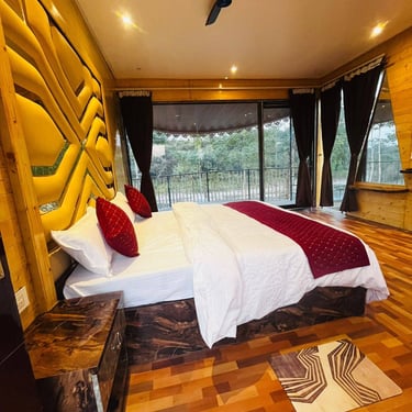 a patio with wicker chairs and a table