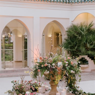 Outdoor dining area at Villa El Rincon in Marbella, with beautiful decorations for a Mediterranean destination wedding.