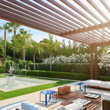 Shaded terrace overlooking private tennis court