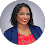 a woman in a red top and blue blazer jacket