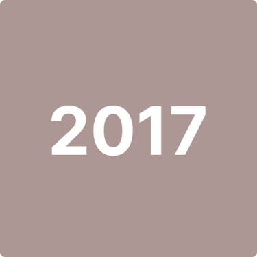 Young students performing a group ballet piece in synchronized harmony.