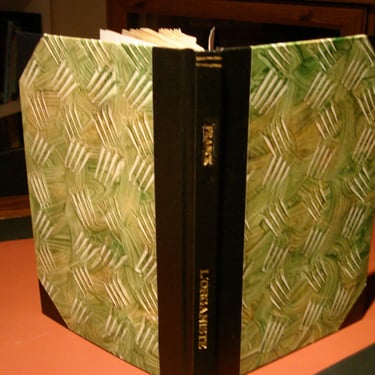 Fully restored with black leather and our paste papers.