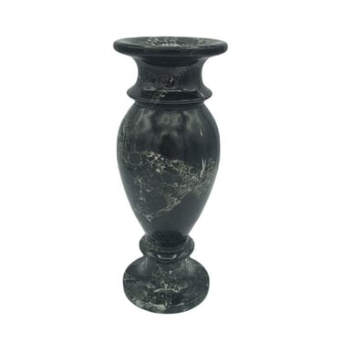 a black marble vase with a marbled vase