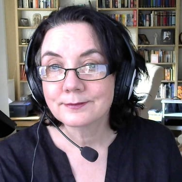 a woman with headphones and a headset on