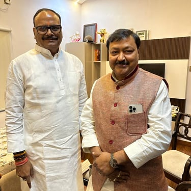 Natwar Goyal with Deputy CM Brijesh Pathak at his residence standing together for photo. Wearing Indian Attire