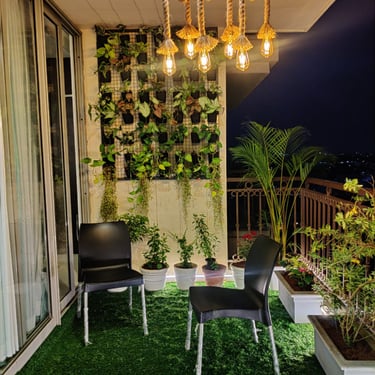 Professional gardening services in Bangalore, showcasing a tidy and vibrant residential lawn by Mygreenearth