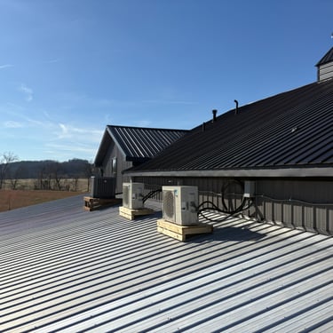 Split system units on top of roof in order to heat and cool garage