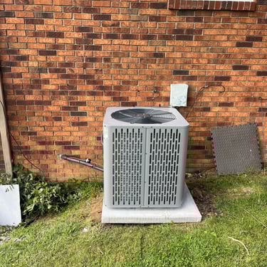Condenser outside of home in Brush Creek, TN. Recent changeout completed.