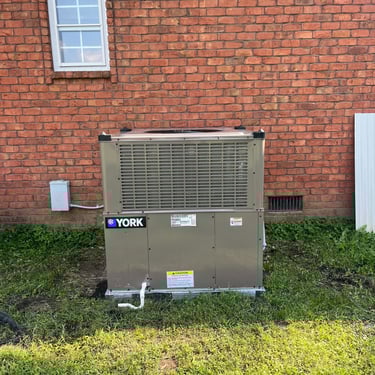Condenser outside of home in Castalian Springs, TN. Recently completed HVAC install.