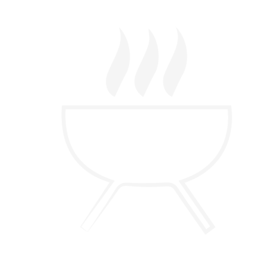 Un barbecue à bois et charbon dans le jardin