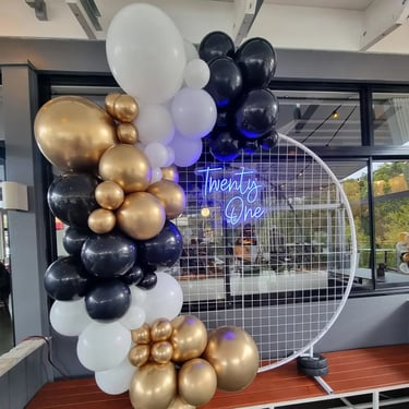 Circle Backdrop setup for a White Birthday in Birkdale, Redlands - party hire by SweetAz Co.