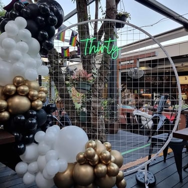 Circle Backdrop created for a White Birthday in Newfarm, Brisbane - party hire by SweetAz Co.