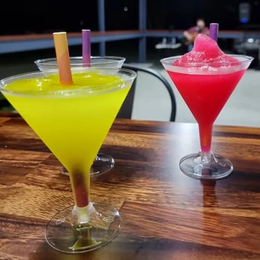 Cocktail cups filled with slushie at the volunteer event at Ormeau Shearers Rugby Club.