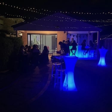 Cocktail Table glowing up the yeard at a 18th Birthday in Cleveland, Redlands - party hire by SweetAz Co.