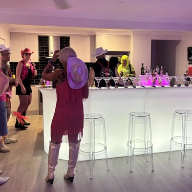 Glow Bar with guests mingling on arrival at a new Years party in Redlandbay, Redlands - party hire by SweetAz Co.