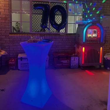 Glow Furniture having experiences together at a 70th Birthday in Cornubia, Logan - party hire by SweetAz Co.