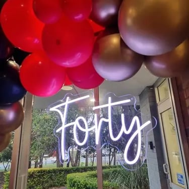 Neon Sign shining bright for a 40Th Birthday in Redlandbay, Redlands - party hire by SweetAz Co.