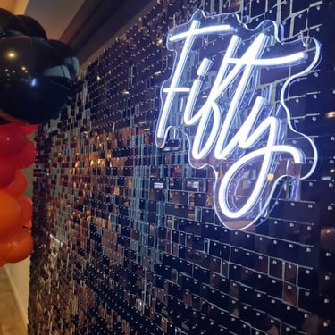 Neon Sign captured during a Fifty Birthday in Wellingtonpoint, Redlands - party hire by SweetAz Co.