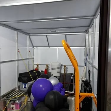 Party specialists setting up moments at a 60th Birthday in Carbrook, Logan - party hire by SweetAz Co.