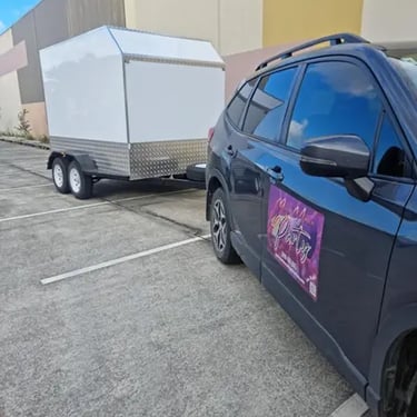 Party specialists taking time out at a Trailer Dropoff in Crestmead, Logan - party hire by SweetAz Co.