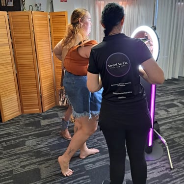 Photo Booth attendant assisting guests at a 21st Event in Wynnum, Brisbane - party hire by SweetAz Co.